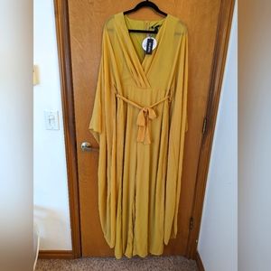 Boohoo wide leg jumpsuit with dramatic wing sleeves.